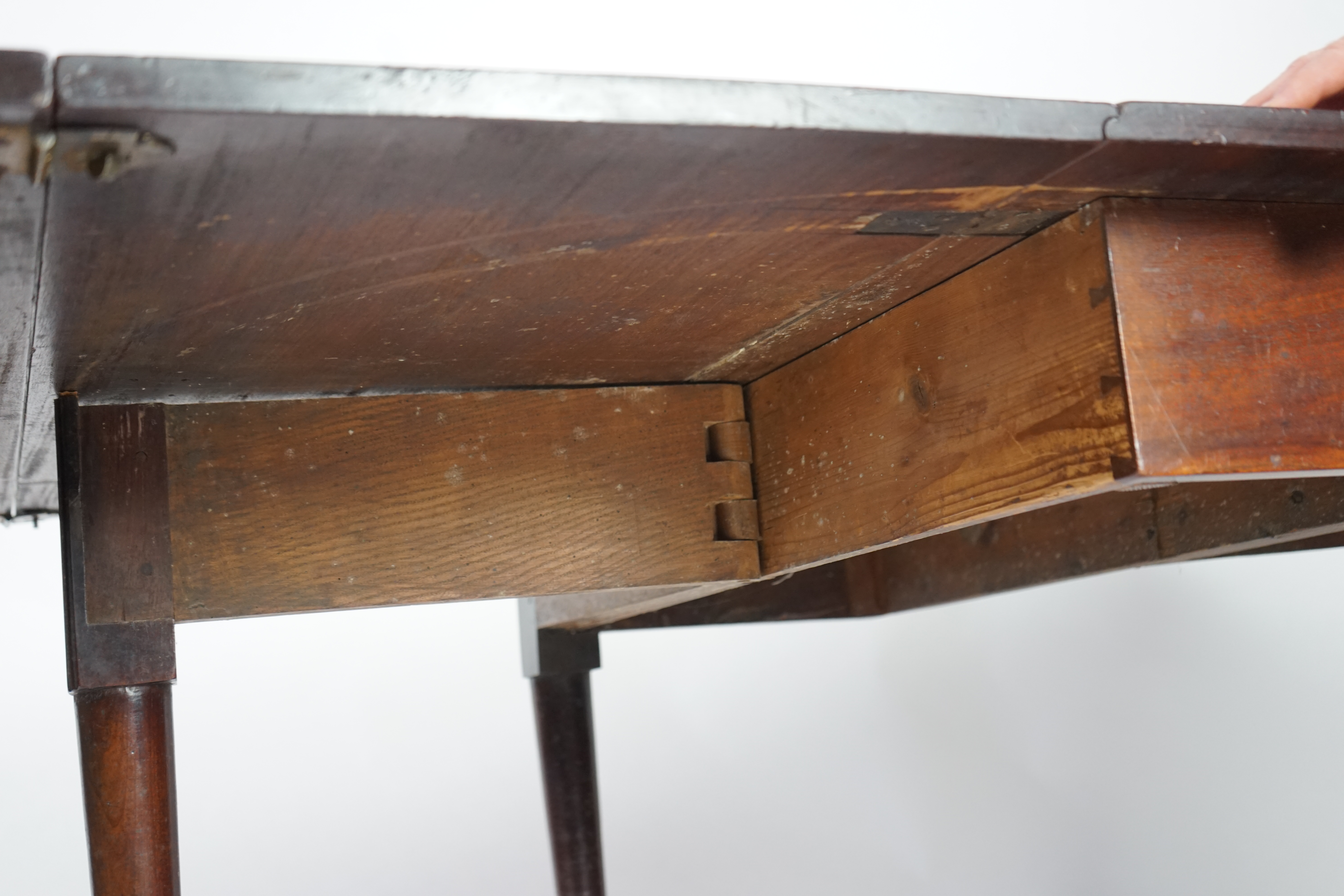 A George II mahogany double drop leaf dining table